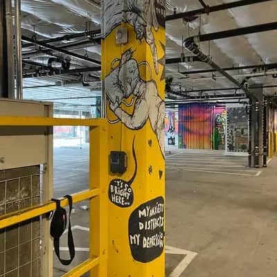 "painting on a pillar at NOVA GARAGE - PORTLAND US" by Robert OBERT in Portland