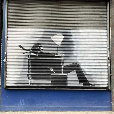 "Silhouetted Figure with Briefcase" by Chris Weller in New York