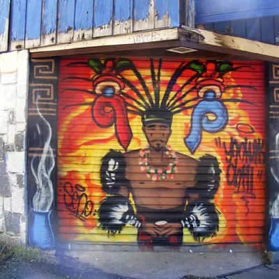 "Indigenous Warrior Portrait Mural" by Various Artists in Portland