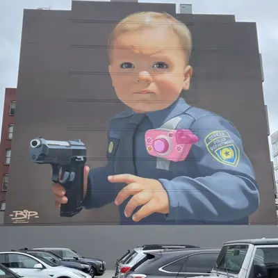 "Baby with a handgun" by BiP in San Francisco