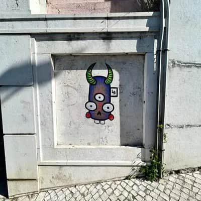 "Three-Eyed Horned Creature" by Lambiscada in Lisbon