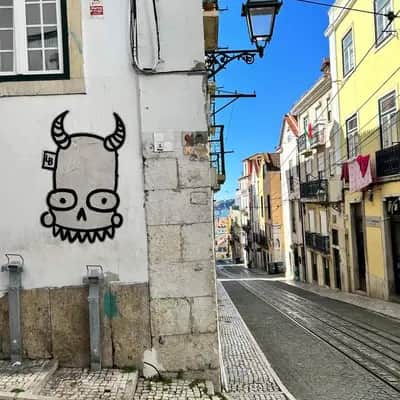 "Horned Skull Street Art" by Lambiscada in Lisbon