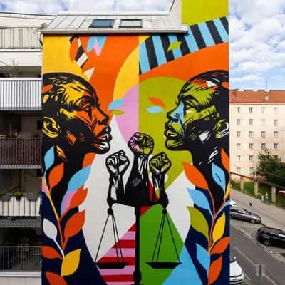 "Justice Scales Portrait Mural" by Osa Seven in Vienna