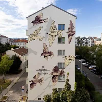 "Flock of Flying Birds Mural" by Mariella Lehner in Vienna
