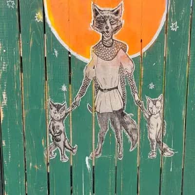 "Fox Family Under Orange Moon" in Seattle