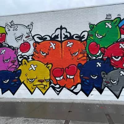 "Cartoon Character Collective Mural" by JC Rivera in Chicago