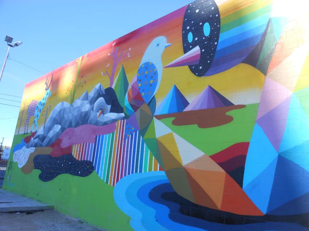 "Geometric Rainbow Landscape Mural" by Okuda in Las Vegas