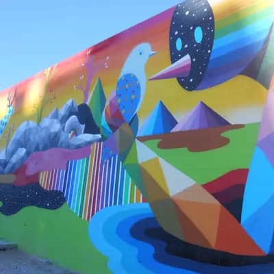"Geometric Rainbow Landscape Mural" by Okuda in Las Vegas