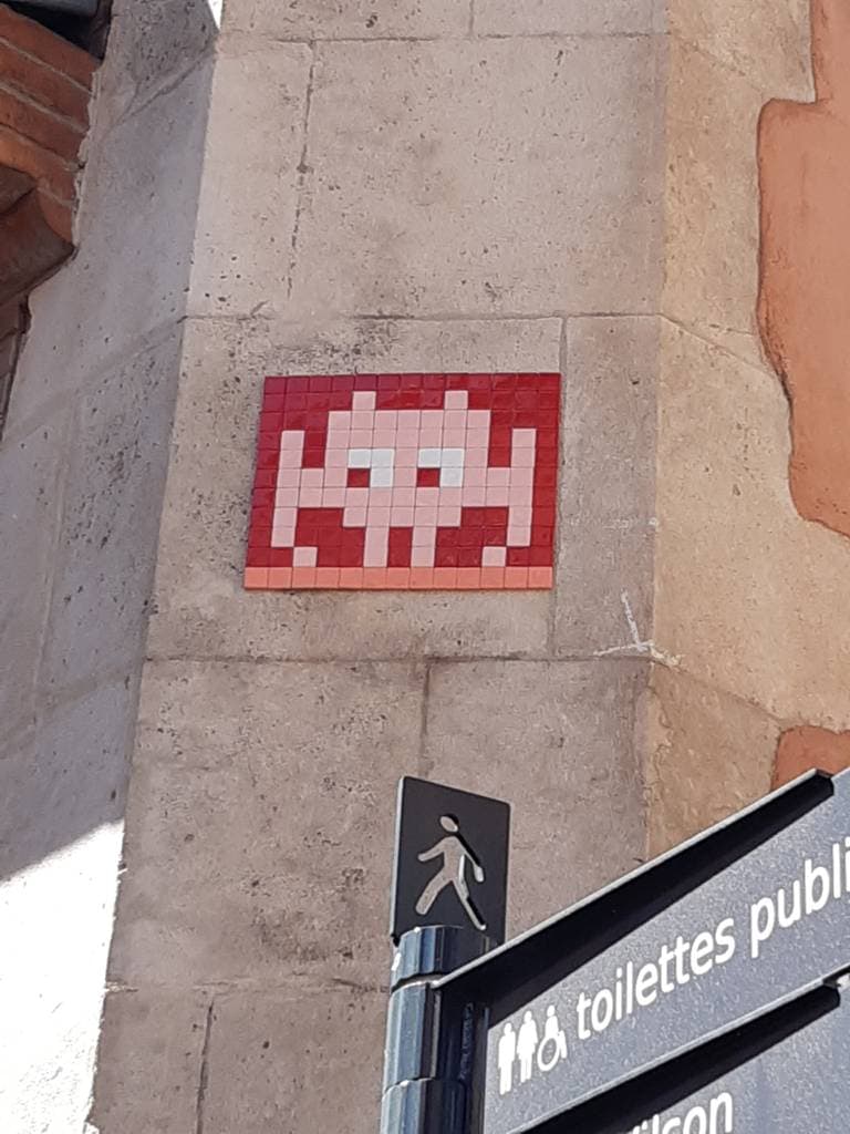 "Red Invader" by Invader in Capitole Arnaud Bernard Carmes, Toulouse