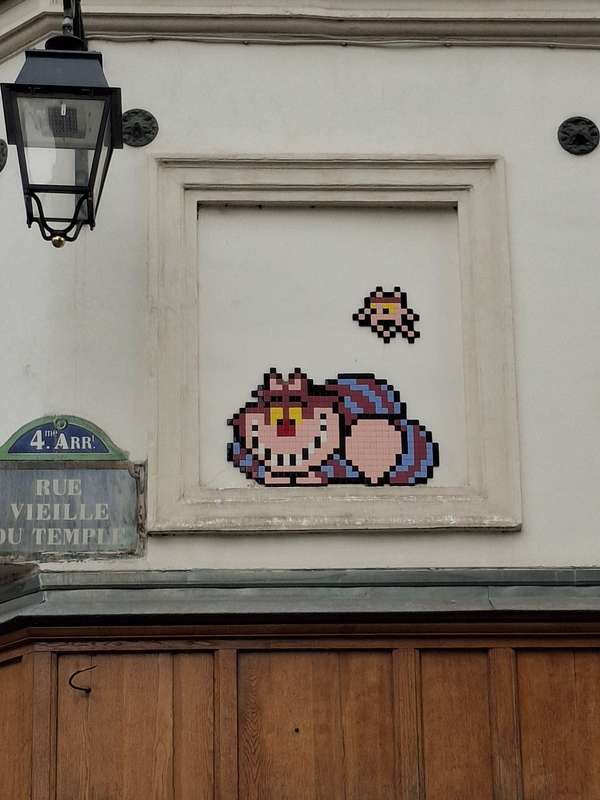 "Le chat du Cheshire - PA_1156" by Invader in Paris 4e Arrondissement, Paris
