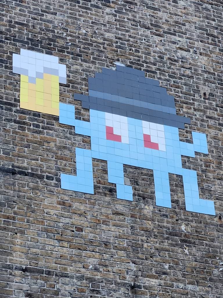 "Bowler & Pint" by Invader in London