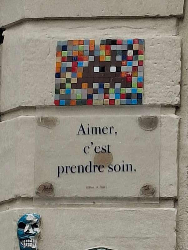 "Aimer, c'est prendre soin." by Invader in Paris 4e Arrondissement, Paris