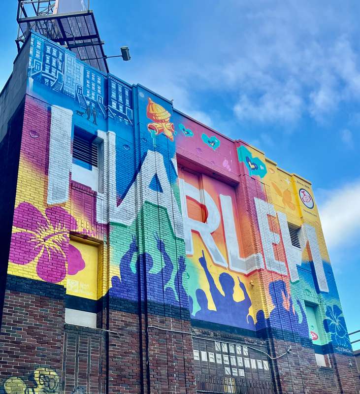 "Harlem Community Pride Mural" by Tats Cru in Manhattan Community Board 9, New York