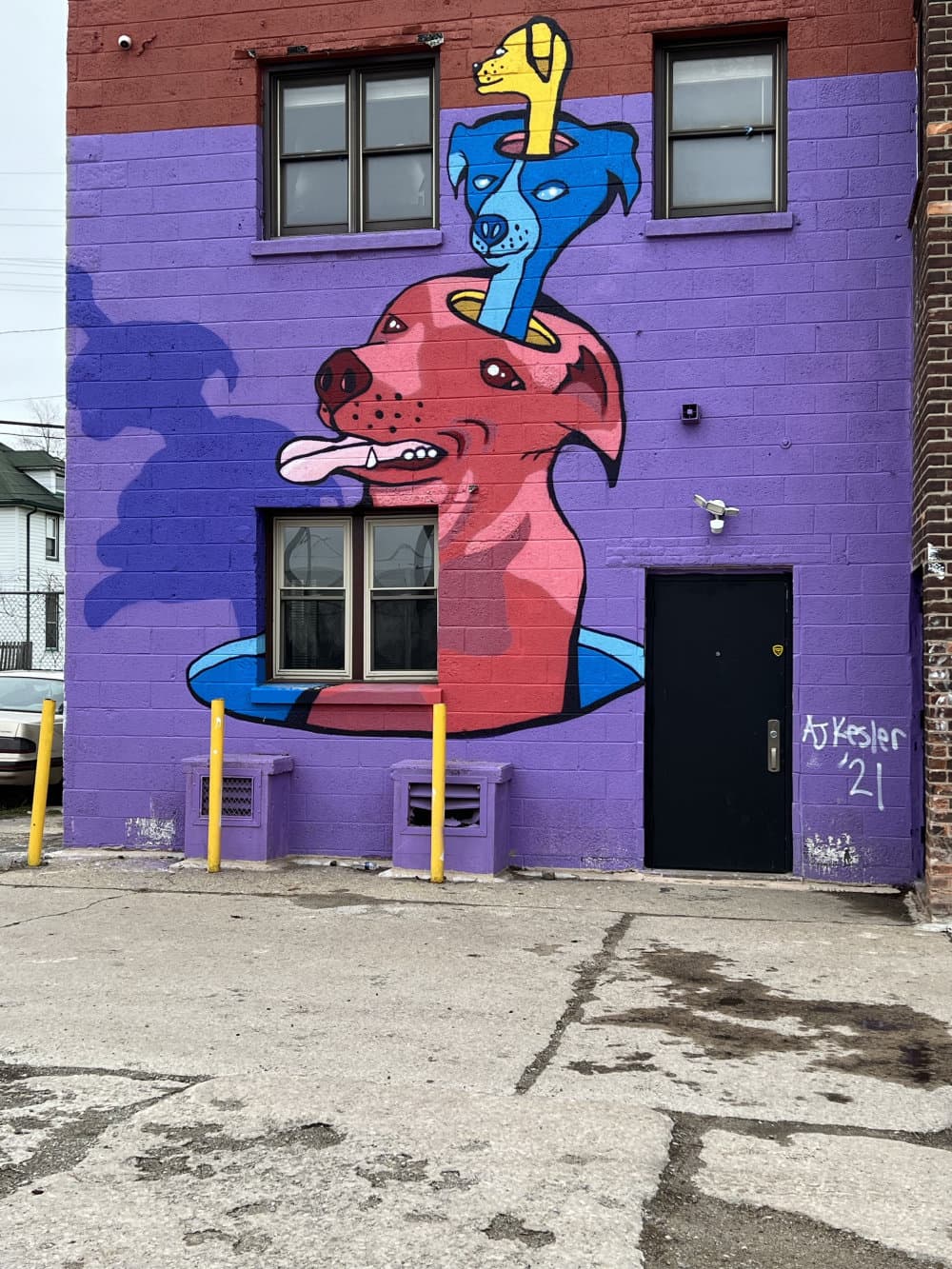 "Stacked Dog Totem Pole" by AJ Kesler in Northwest Goldberg, Detroit