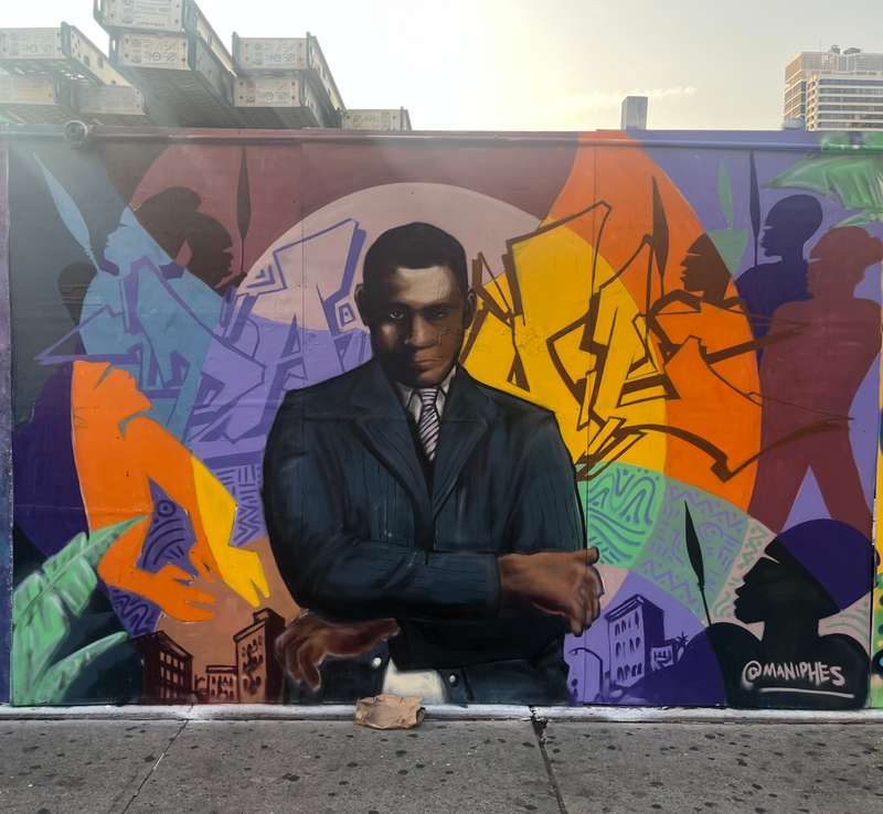 "Portrait of Suited Figure" by Maniphes in Manhattan Community Board 11, New York