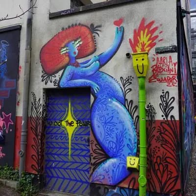 Blue Figure with Red Mohawk