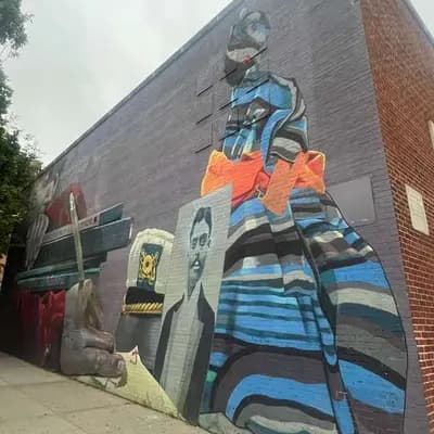 Figure in Blue Striped Hoodie