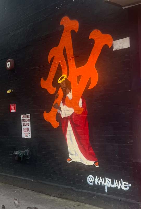 "Figure in Flames" by Kaysuane in East Harlem, New York