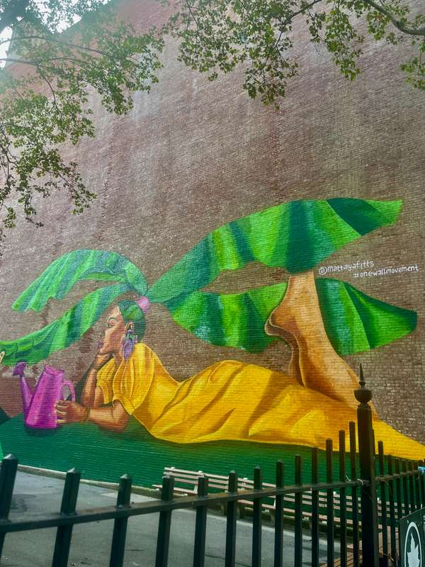 "Woman Under Banana Tree" by Mattaya Fitts in Manhattan Community Board 11, New York