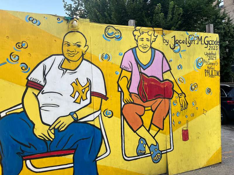 "Two Figures on Yellow Wall" by Jocelyn M. Goode in Manhattan Community Board 11, New York