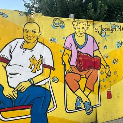 Two Figures on Yellow Wall