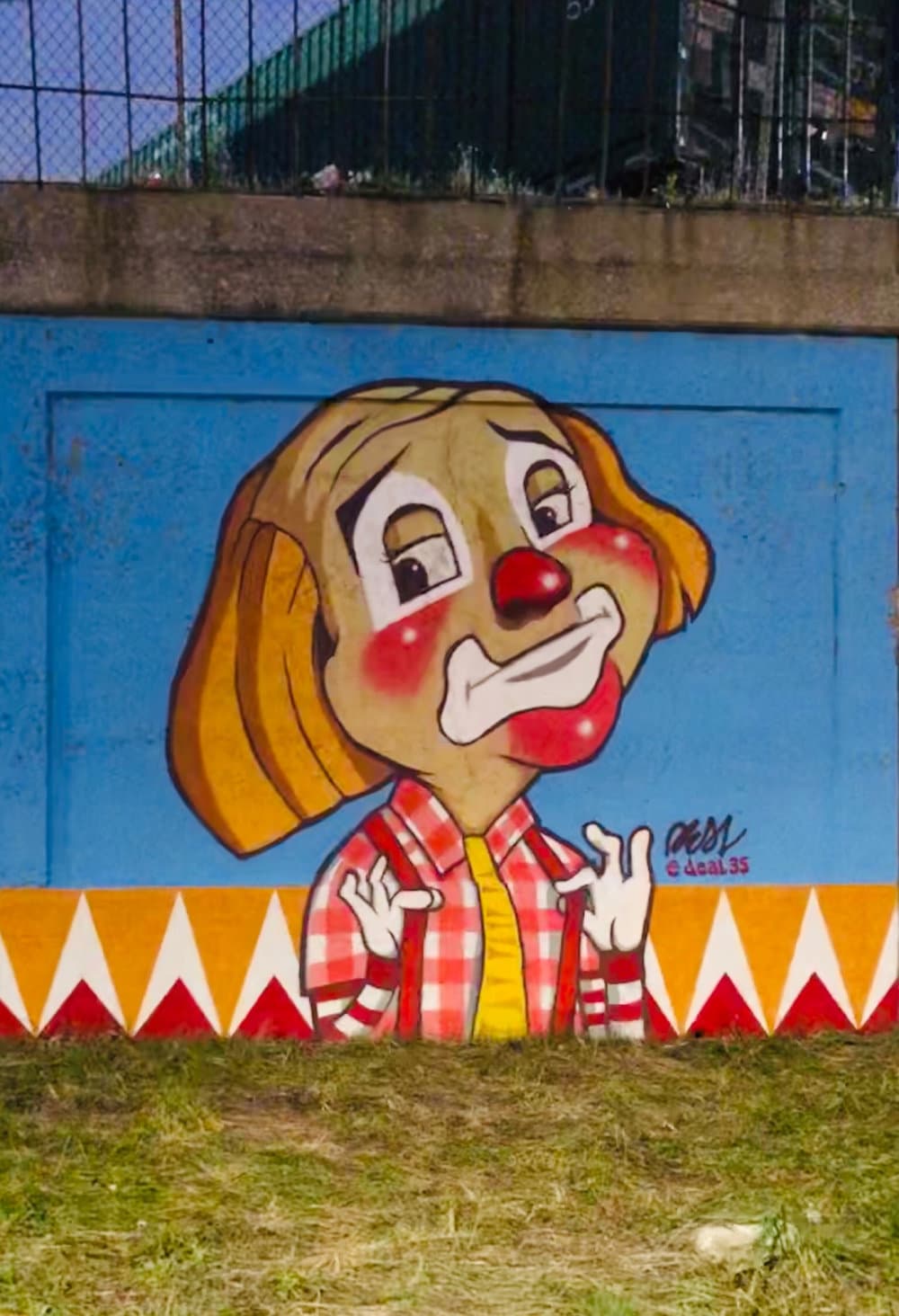 "Cheerful Clown Portrait Mural" by Deal35 in Illinois Medical District, Chicago