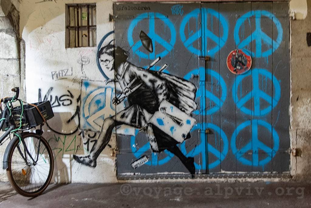 "Girl running with wet stencil" by Falco in Le Clos Saint Michel, Annecy