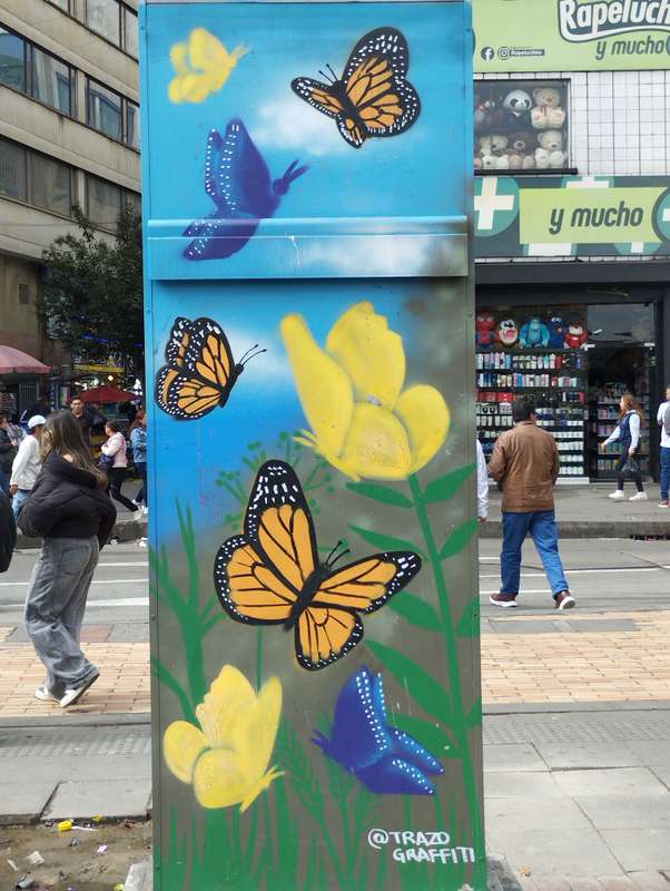 "Butterflies" by Trazo graffiti in Los Mrtires, Bogota