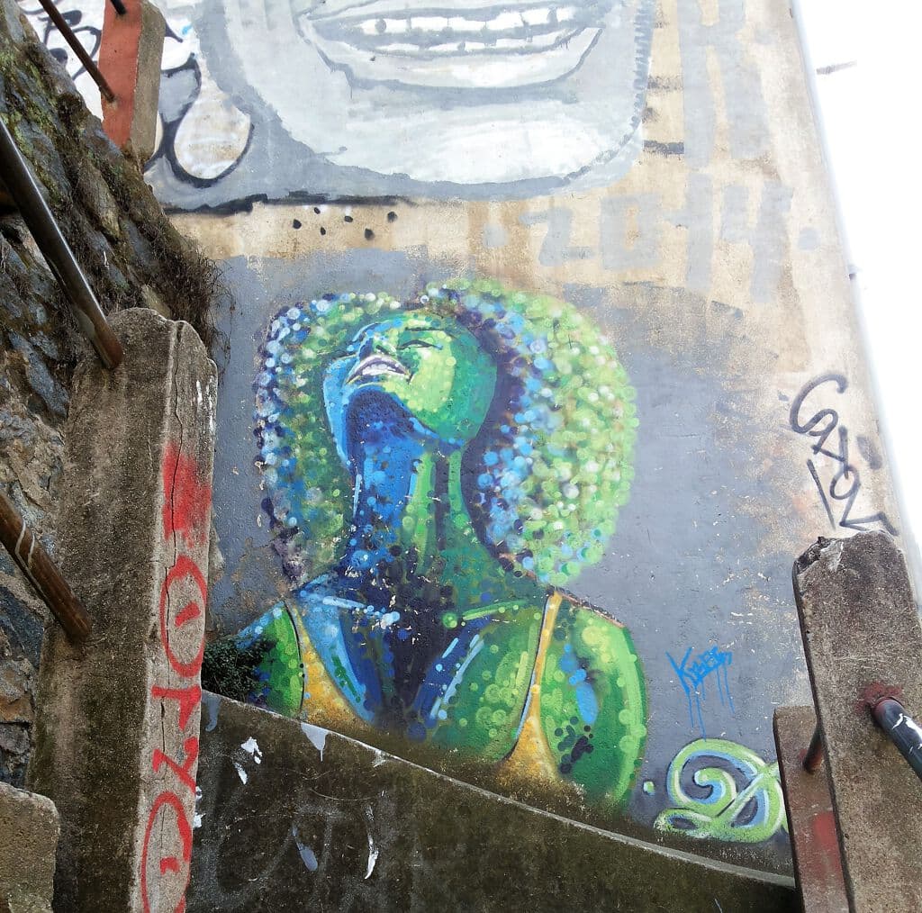 "Woman looking up" by Dasic Fernandez in Cerro Alegre, Valparaiso