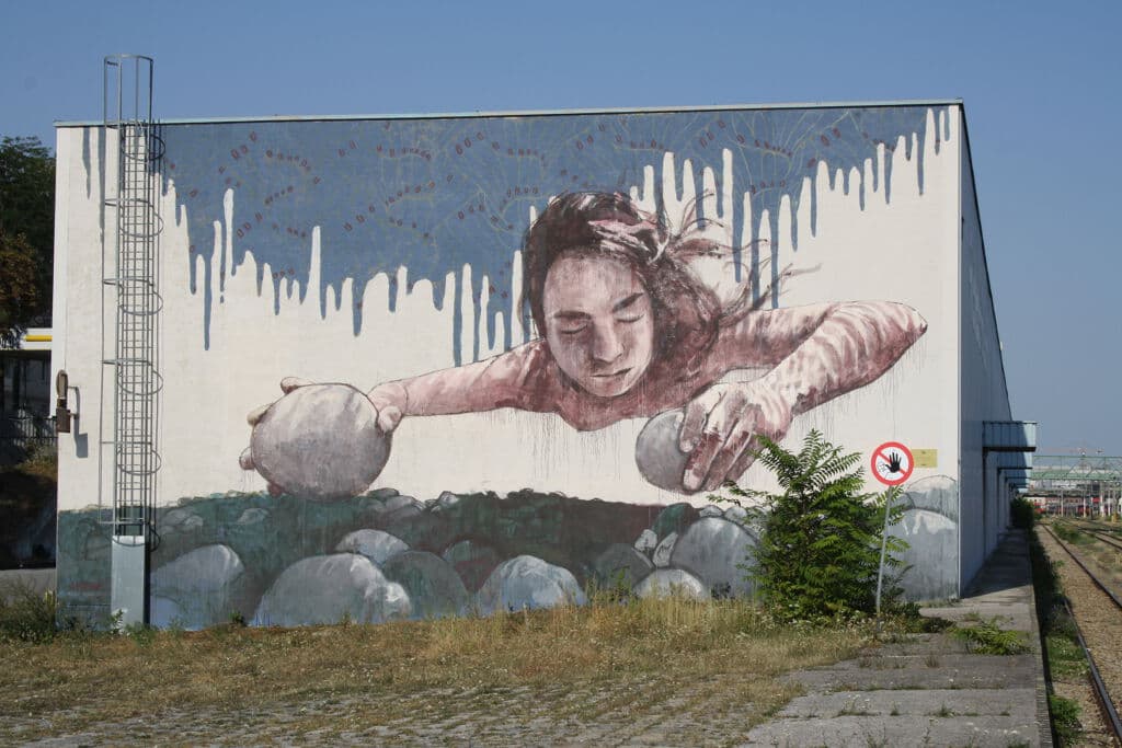 Child Playing with Stones