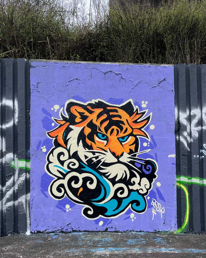 Tiger Head with Ornamental Swirls