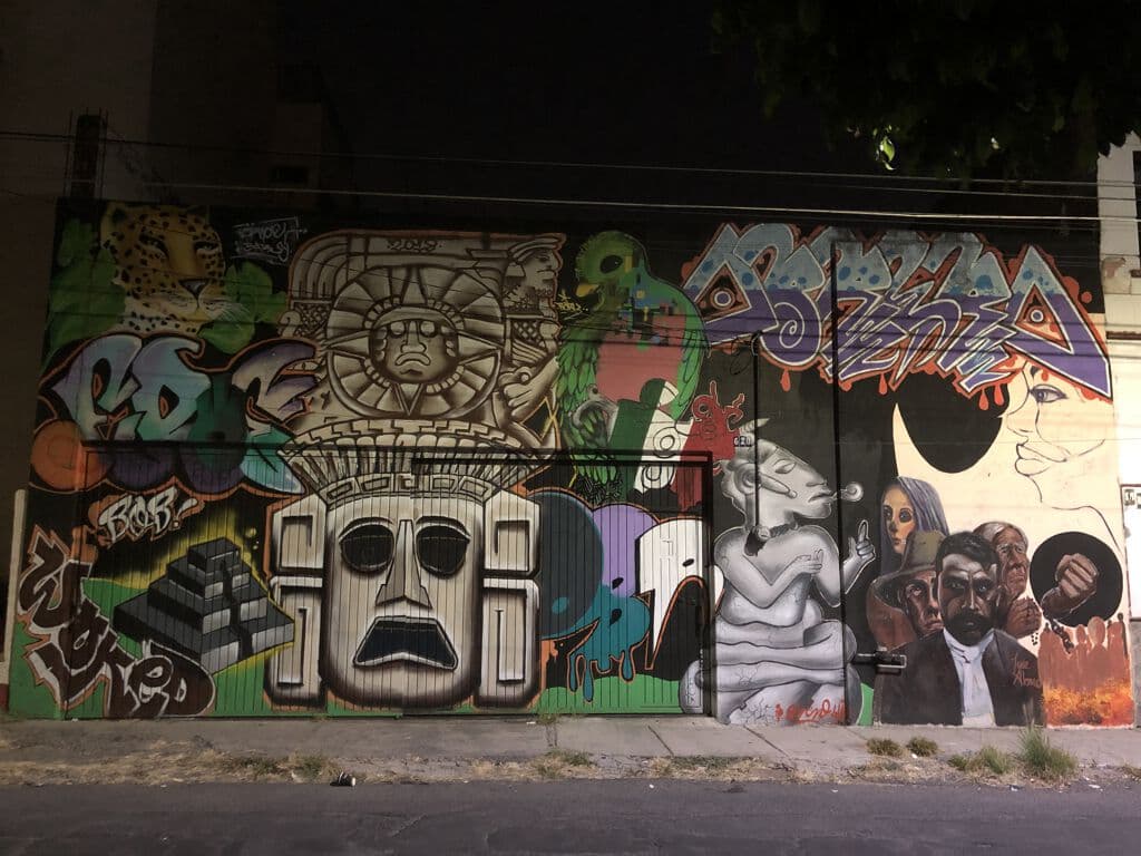 Urban Mural with Mesoamerican and Contemporary Imagery