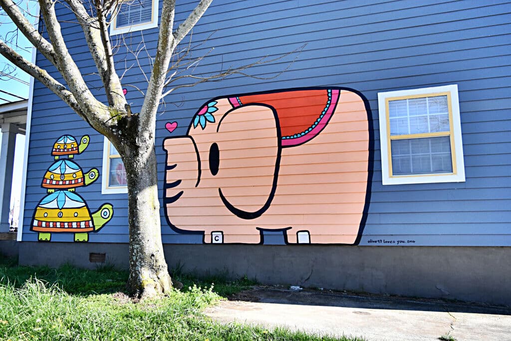 Playful Elephant and Stacked Turtles