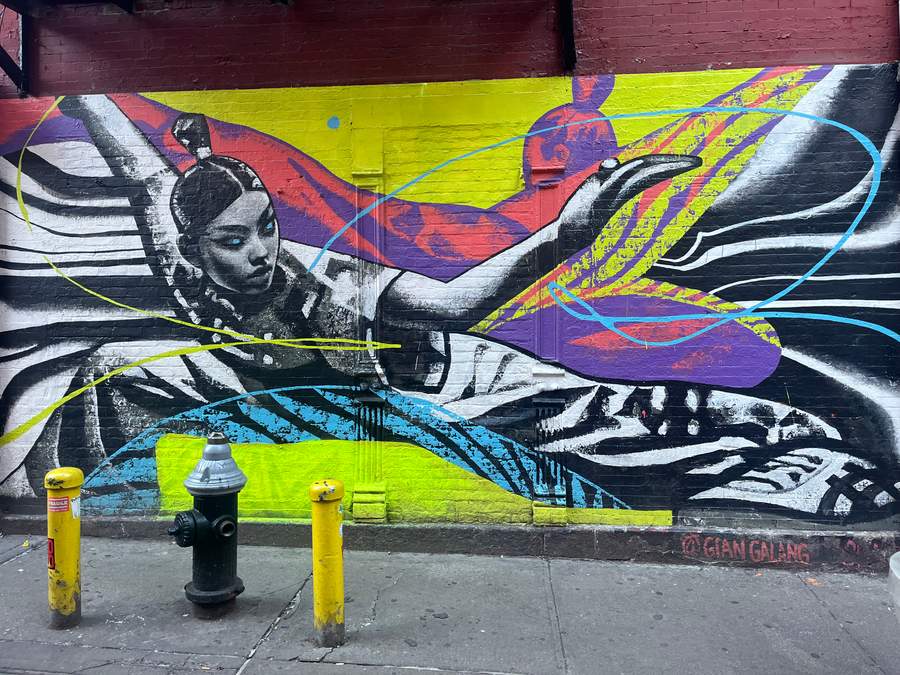 Winged Figure Street Mural