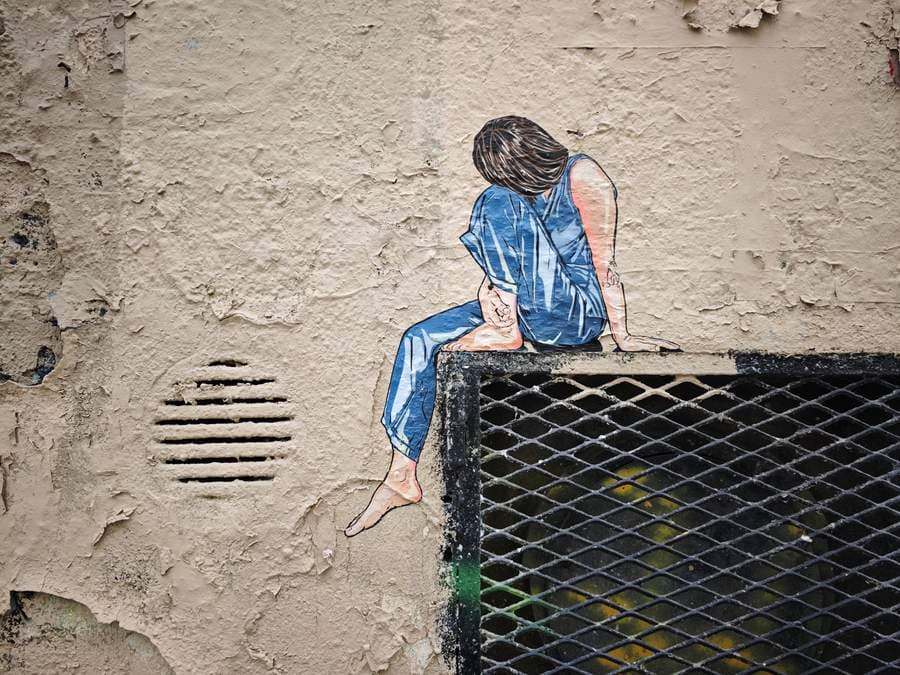 "Contemplative Figure on Wall" by Jana & JS in Paris 10e Arrondissement, Paris
