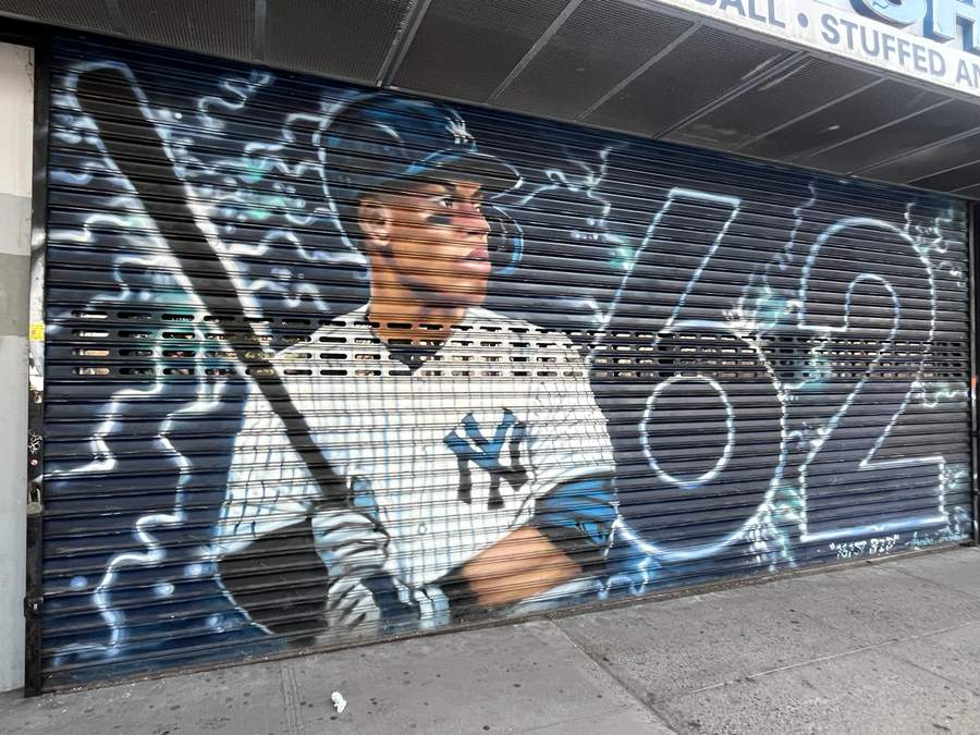 "Baseball Player Street Mural" by Andre Trenier in The Bronx, New York