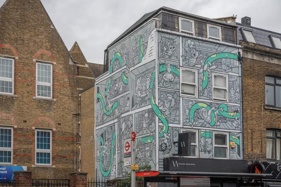 "Serpent-Wrapped Monochrome Comic Facade" by Captain Kris in Whitechapel, London