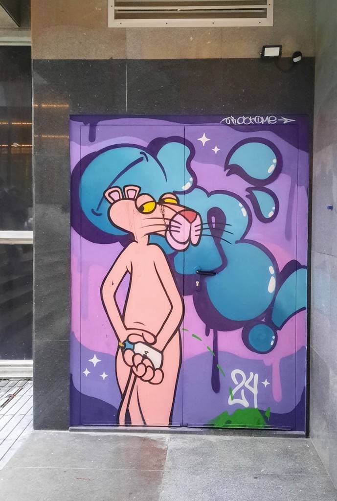 "Whimsical Figure with Surreal Clouds" in Baixa Do Porto, Porto