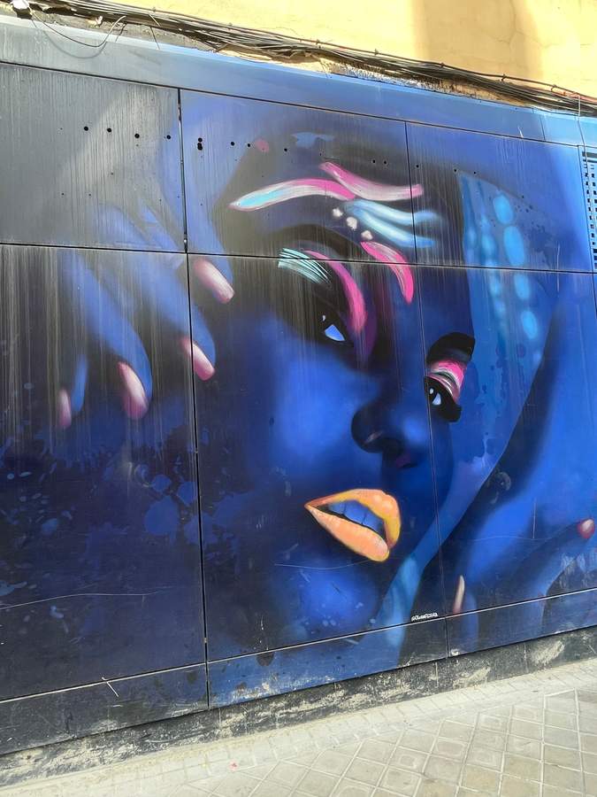 "faces of women wearing makeup" by Olor a Pintura in Usera, Madrid