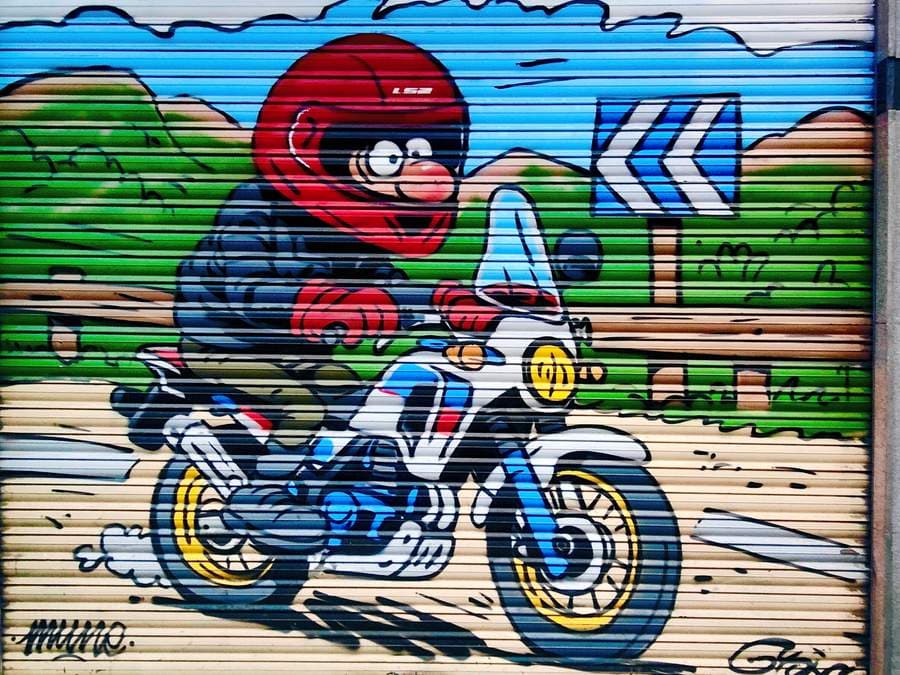 "PACO EL MOTERO" by Graffiti Negocios in Arganzuela, Madrid