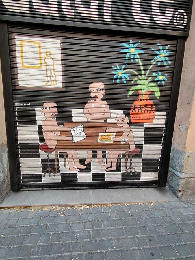 Untitled street art by slurveart in Lavapis, Madrid