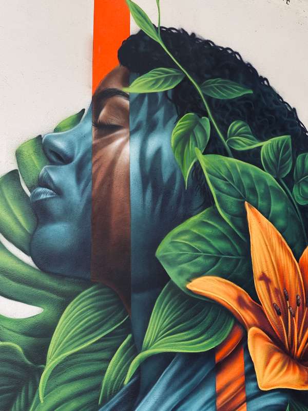 "Woman Emerging from Nature's Embrace" by Clara Leff in Boaava, São Paulo