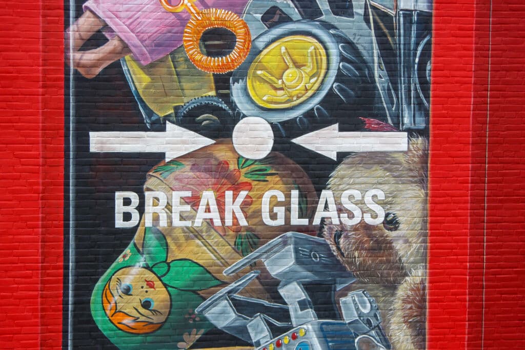 "In case of lost childhood, break glass" by Leon Keer in Oost, Amsterdam