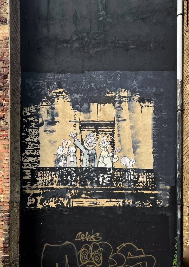 "Balcony family / Royal family" by Banksy in Stoke Newington, London