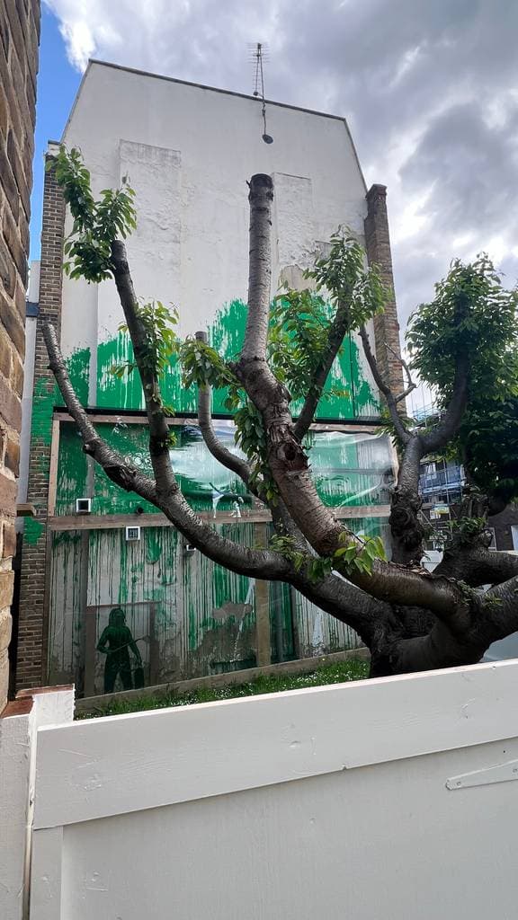 "Green Dripping Forest Mural" by Banksy in Holloway, London