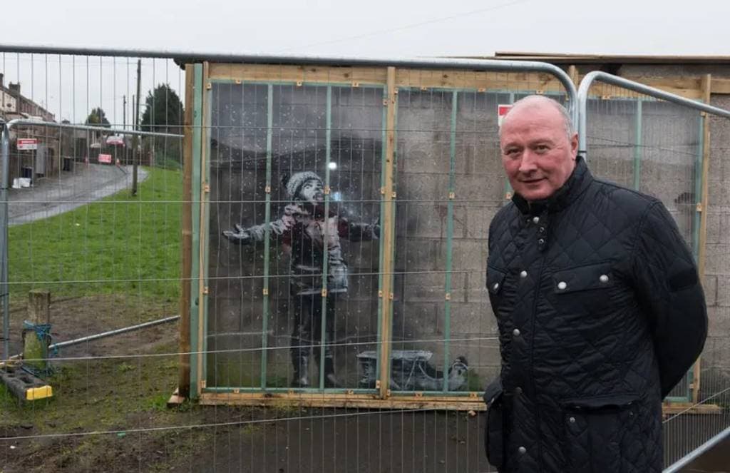 "Season's Greetings" by Banksy in Taibach, Port Talbot