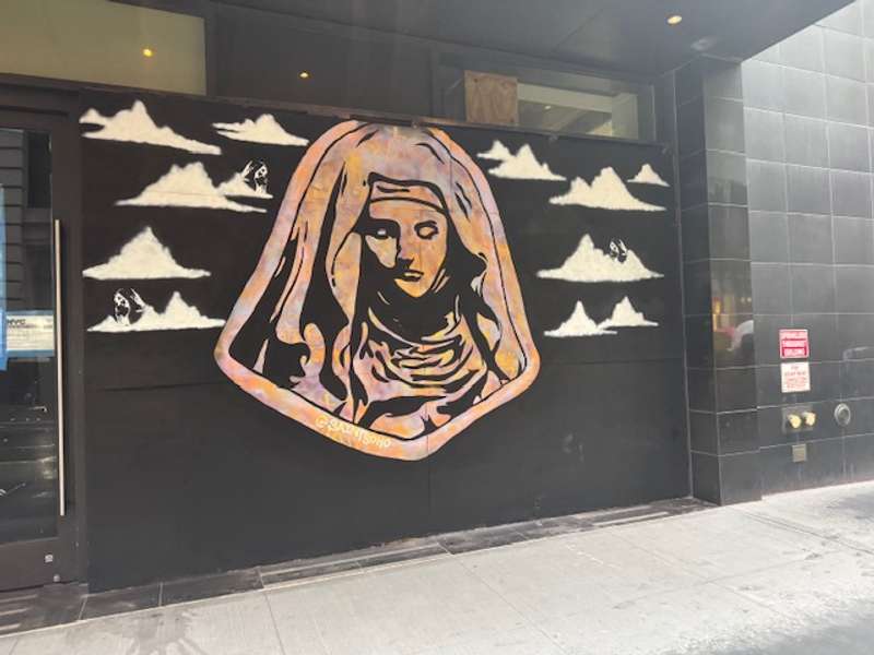 Hooded Figure Mountain Mural