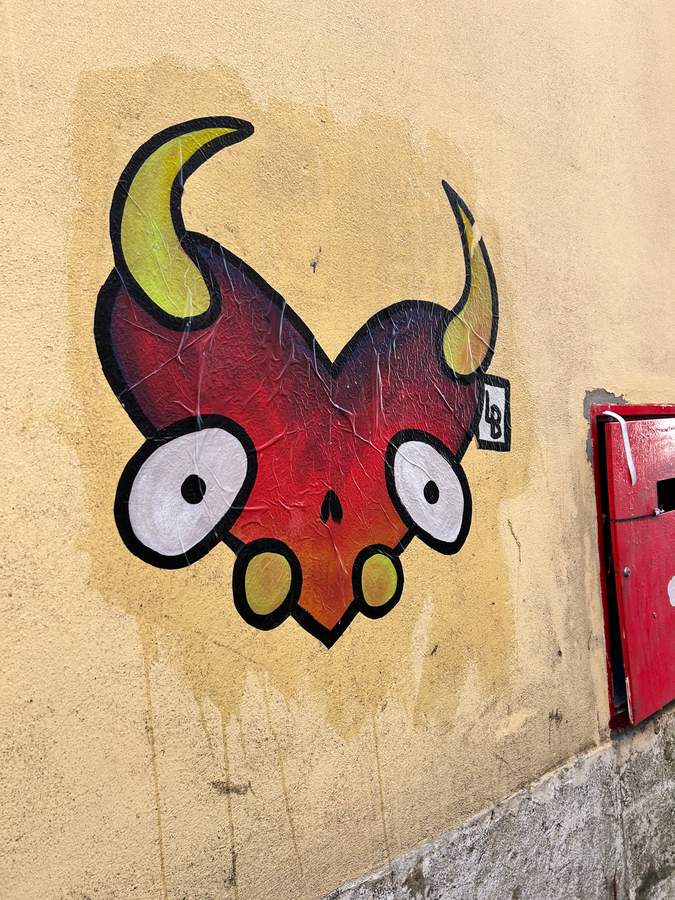 "Horned Devil Character Mural" by Lambiscada in Bairro Alto, Lisbon