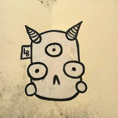 Three-Eyed Horned Character