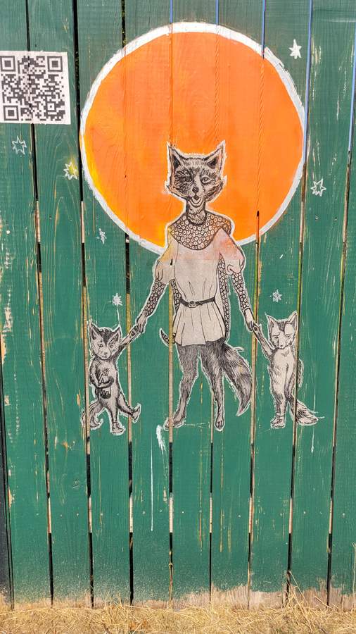 Fox Family Under Orange Moon